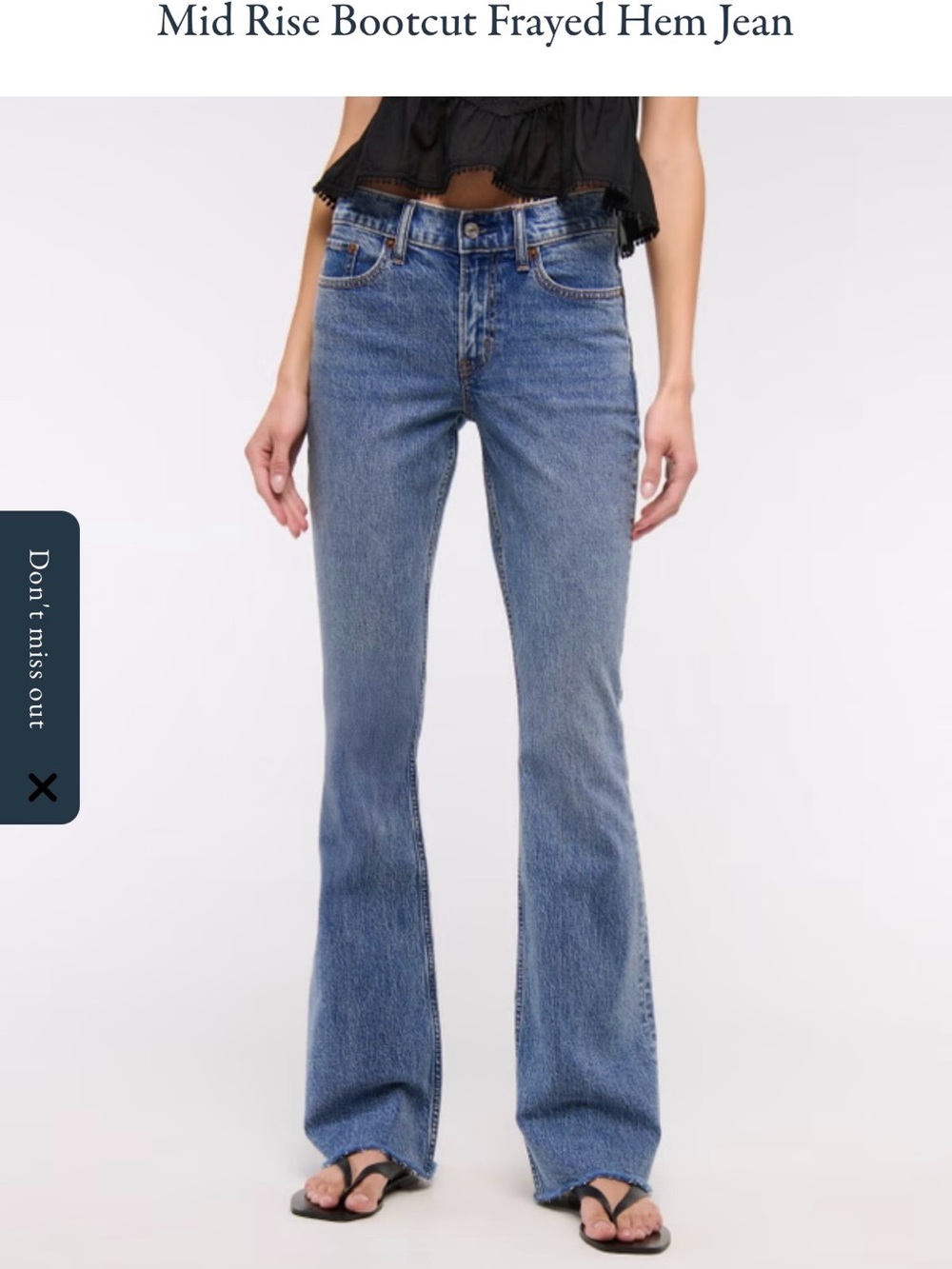Mid Rise boot cut frayed hem